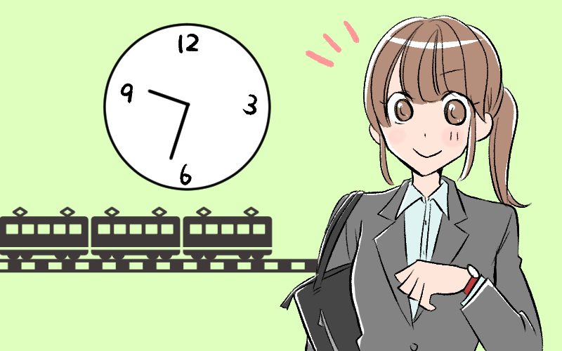 電車の時間を確認する女性