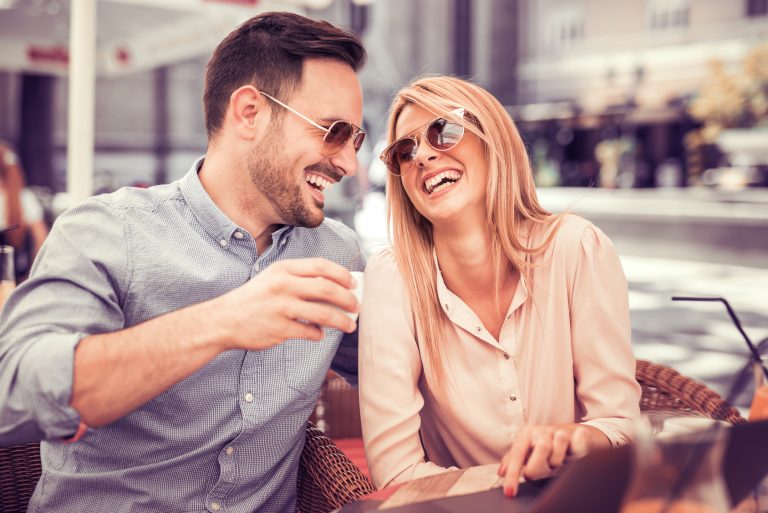 Happy young couple having fun in the city